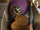 a cardboard box filled with assorted items on the floor