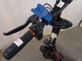 a scooter that has a handlebar attached to it