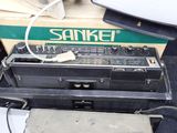 an old radio sitting on top of a box