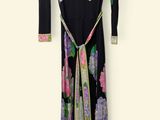 black and multicolored floral print dress on hanger