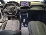 the interior of a car with a steering wheel, dashboard, and dash board