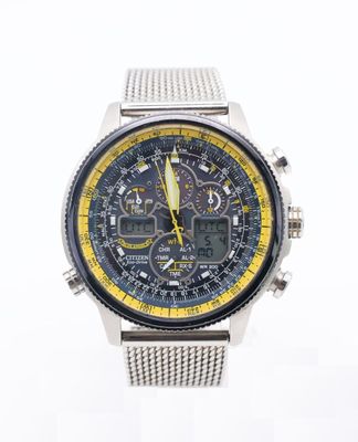 the watch is silver and yellow on a white background
