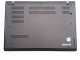 a black laptop with a blue sticker on it