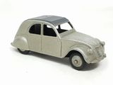 a toy car that is sitting on a white surface