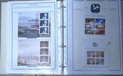 a binder with pictures of people on it sitting on a table