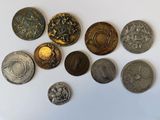 a lot of coins that are sitting on a table