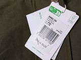 a green jacket with a barcode on the back of it