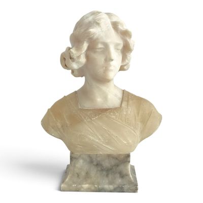 marble bust of a woman on a marble base with a white background