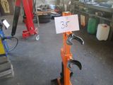a sign that says 3 33 on it in a garage