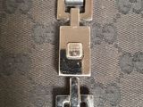 an image of a close up of a purse with a metal clasp
