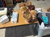 many different types of wigs on a table
