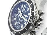 a close up of a watch on a white background