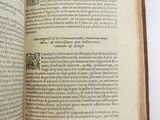 an open book with a picture of a bird on it