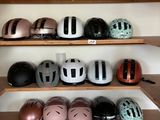 many helmets on the shelves in the store
