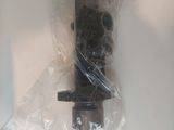 a plastic bag with a remote control attached to it