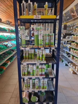 a rack with many different products in it in a store