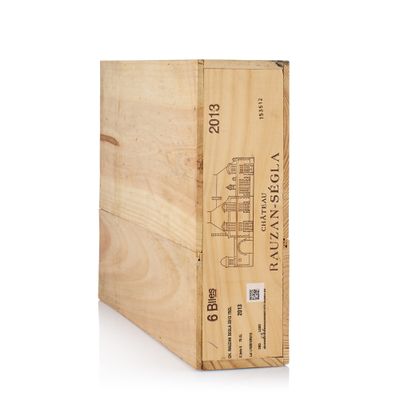 the wooden box is holding a bottle of wine on a white surface