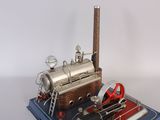 a small model of a steam engine on a table