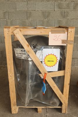 a wooden crate with a pair of scissors inside of it