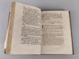 a book open on a table with a page in it