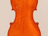 an old violin with a very long neck and a very long back