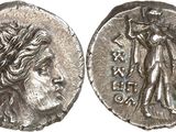 a silver coin with an image of a woman on it