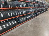 many tires on the shelves in the warehouse