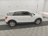 an image of a white suv parked in a garage