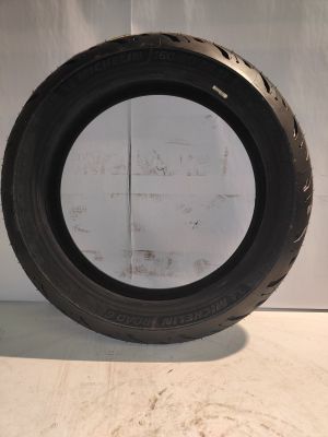 a close up of a tire tire on a white surface