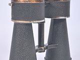 a pair of binoculars that are sitting on a table