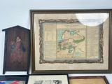 a picture of a collection of framed maps on a table