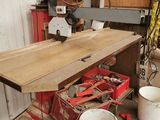 a picture of a workbench in a garage with tools