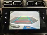 a picture of a car ' s rear view camera in the dash