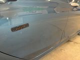 a close up of a car with a sticker on it