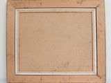an old wooden picture frame with a white border on a white wall
