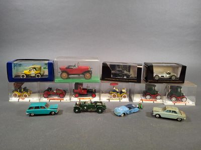 a lot of toy cars that are in a display case
