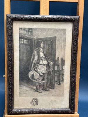 une vieille photo représentant un homme assis sur une chaise à côté d'un chien