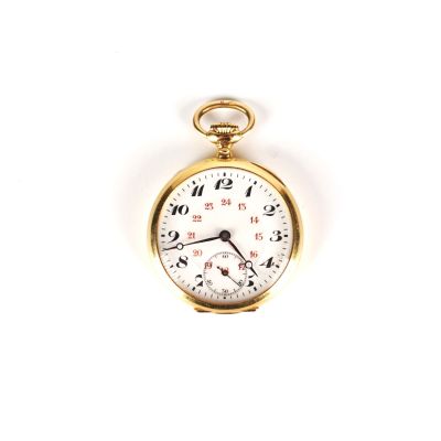 une montre de poche en or sur fond blanc