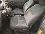 a car that has a steering wheel and a seat in it