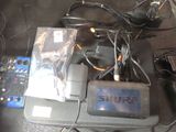 a lot of electronics that are sitting on a table