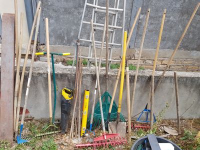 a lot of tools that are laying out on the ground