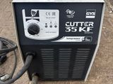 a machine that is sitting outside on the ground
