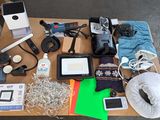 a table with a lot of electronics on it