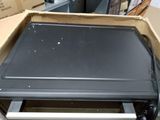 a box that has a microwave inside of it