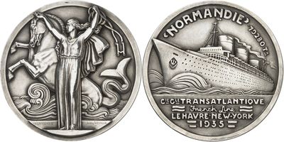 a close up of a coin with a ship on it