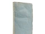 a blue book sitting on top of a white table