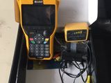 a box that has a cell phone and a keyboard in it