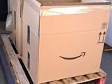 a box that is sitting on a pallet in the garage