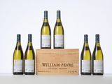 six bottles of white wine in front of a wooden crate