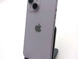 a close up of an iphone with a camera on a stand